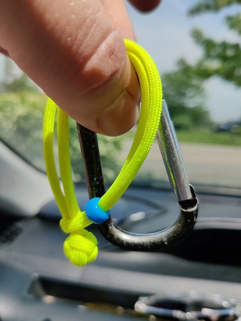 exhibit 1 a carabiner and a shacke of the same size